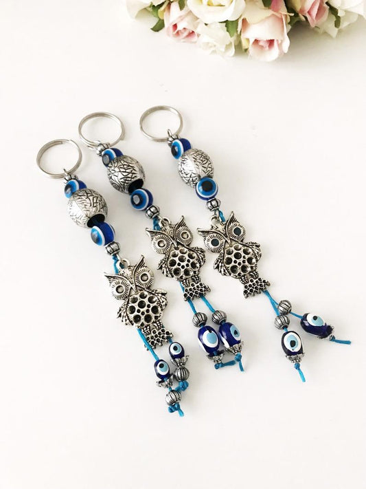 Metal owl keychain with evileye
