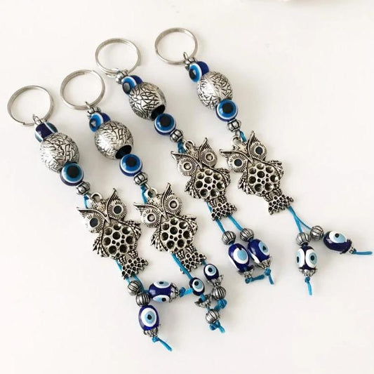 Metal owl keychain with evileye