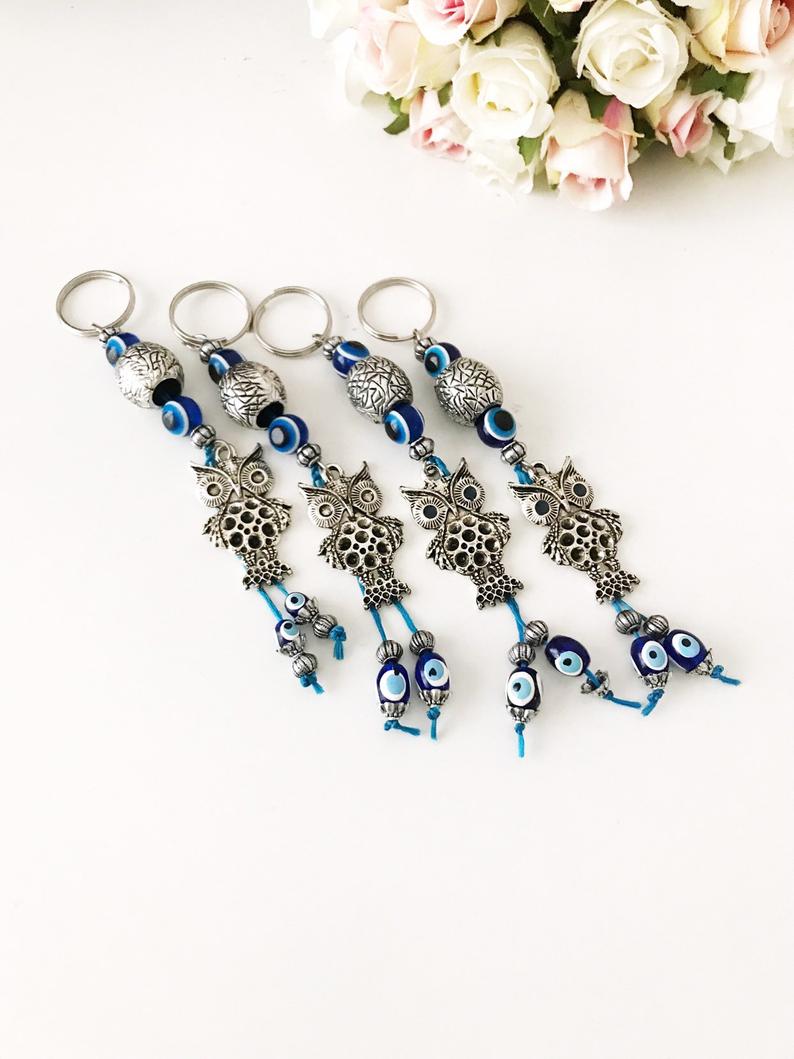 Metal owl keychain with evileye
